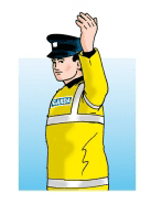 Garda beckoning traffic on